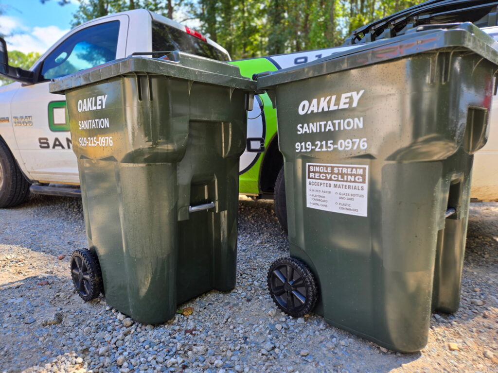2 trash cans in front of truck